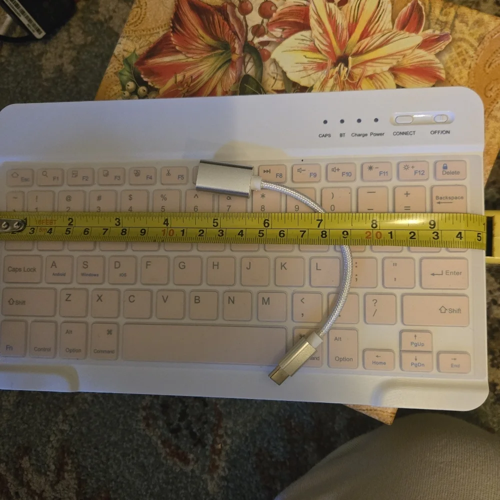 Bluetooth Keuboard For Cell Phones Or Tablets Comes With USB Cord Pink And White